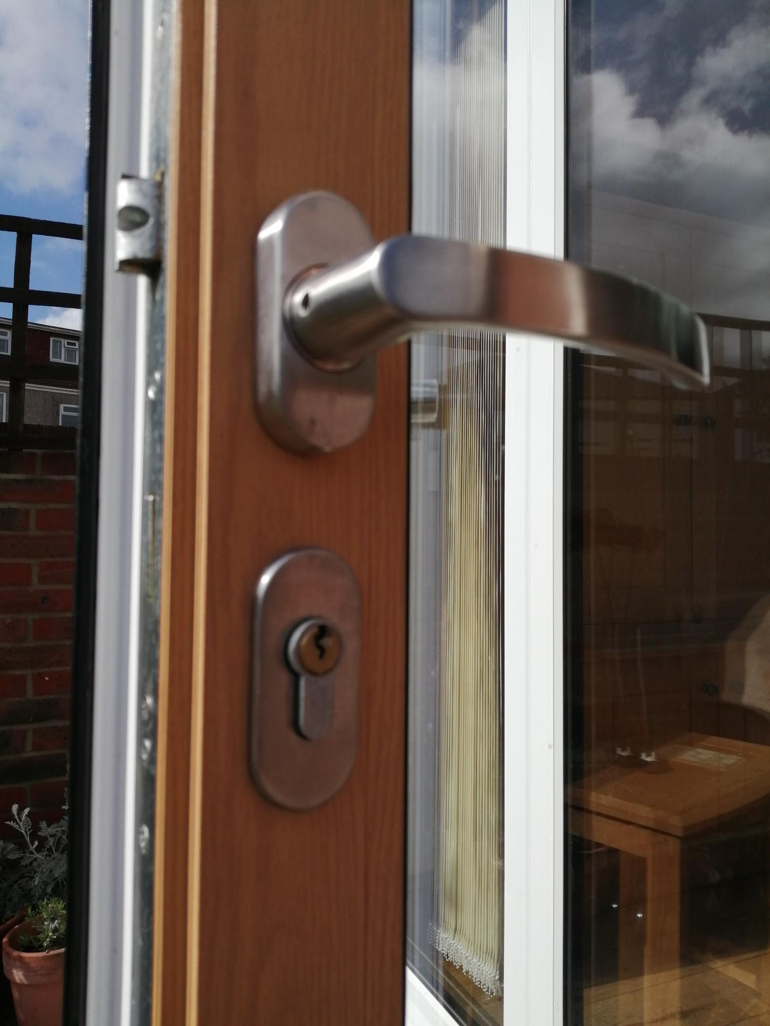 A euro-cylinder lock and handle fitted to a door by Lock-on Security